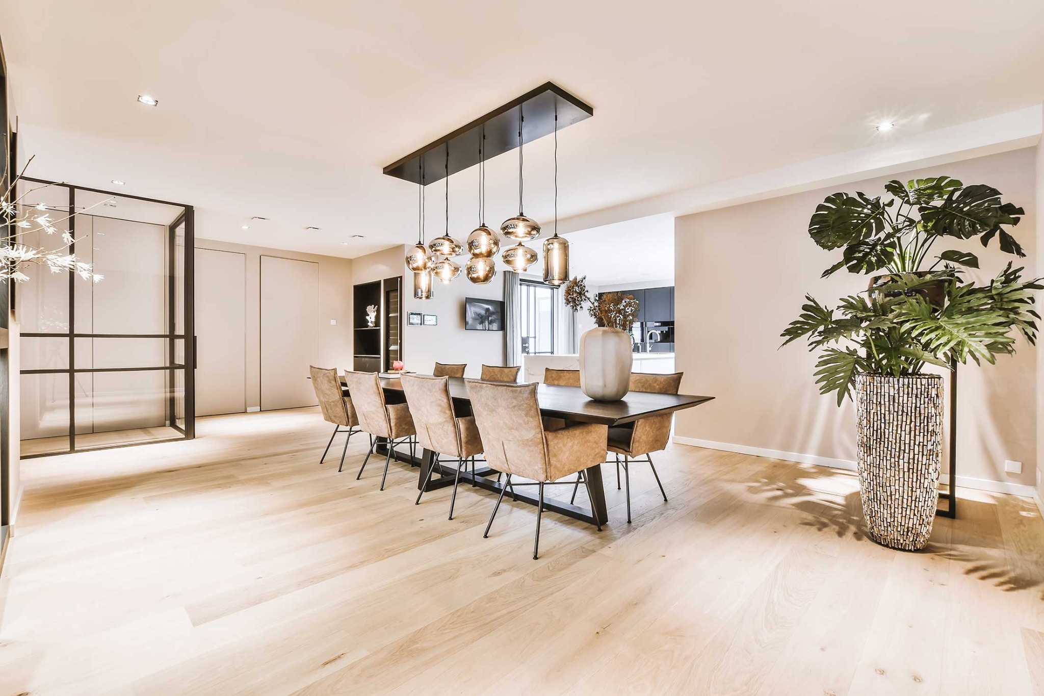 Bright dining room with light wood-look laminate flooring